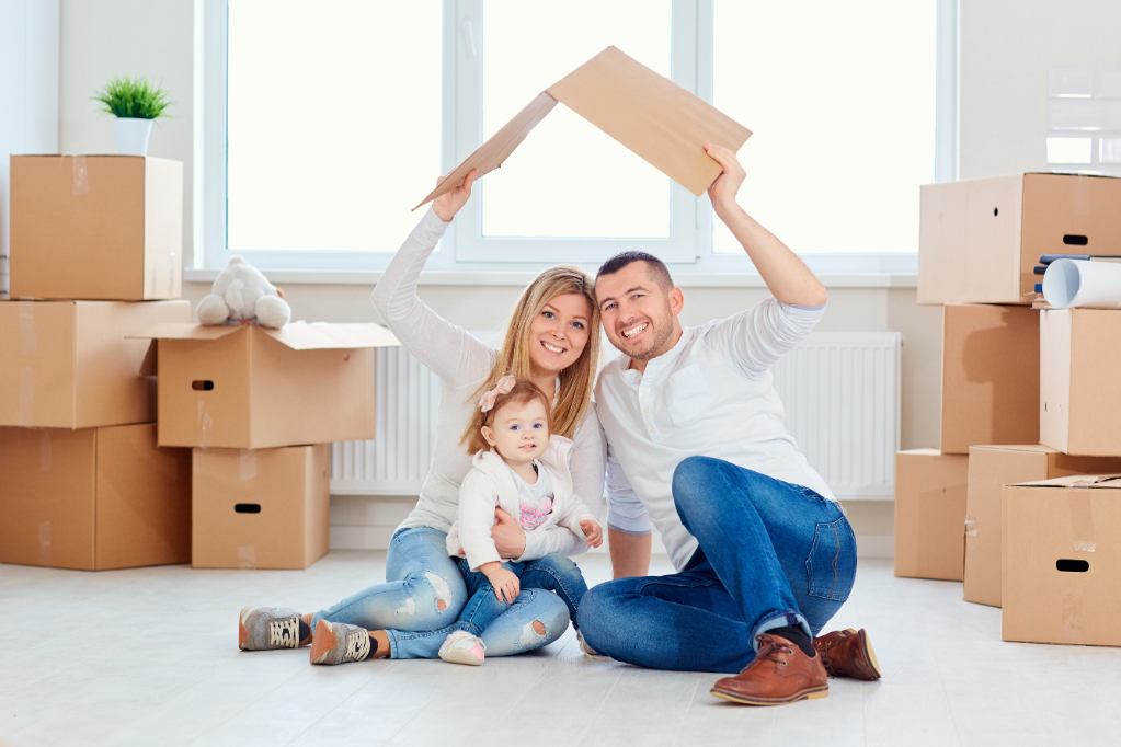 A happy family moves to a new apartment.